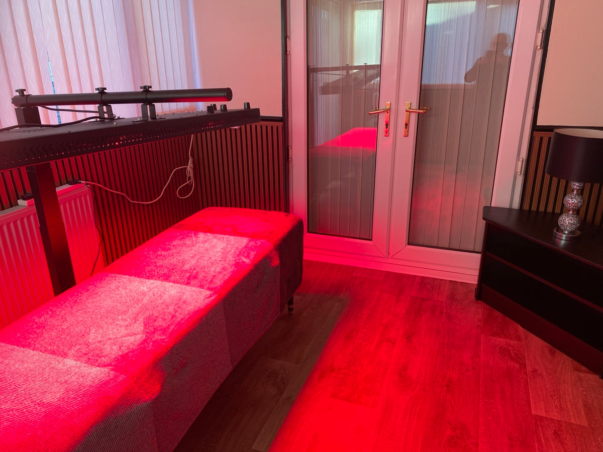 Lumaterra’s existing red-light panel above the massage couch in the Doncaster studio